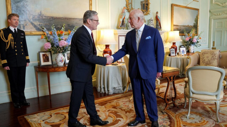 King Charles III welcomes Sir Keir Starmer during an audience at Buckingham Palace. 