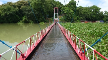 Kaptai hanging bridge goes under water, tourists movement suspended