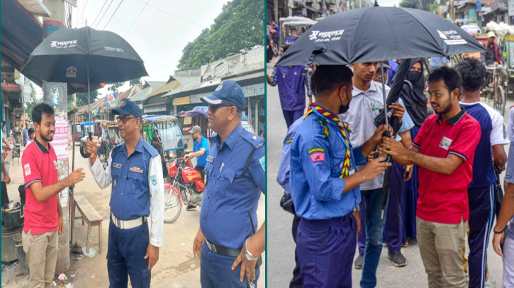 ট্রাফিক পুলিশ ও শিক্ষার্থীদের সৃজনশীল গাইবান্ধা’র ছাতা বিতরণ