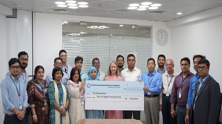 Signing and Cheque handed over ceremony held at AIUB Signing and Cheque handed over ceremony held at AIUB