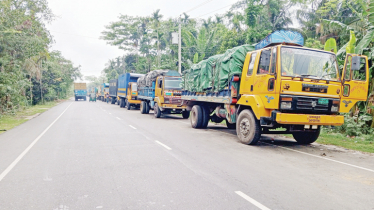 Hundreds of vehicles waiting to cross Meghna in ferry