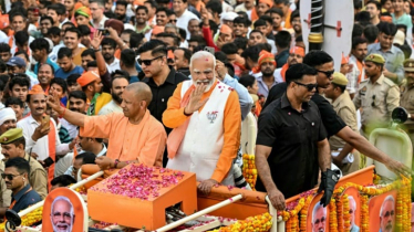 Sea of saffron as India’s Modi visits Hindu holy city
